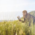 MAN READING BOOK