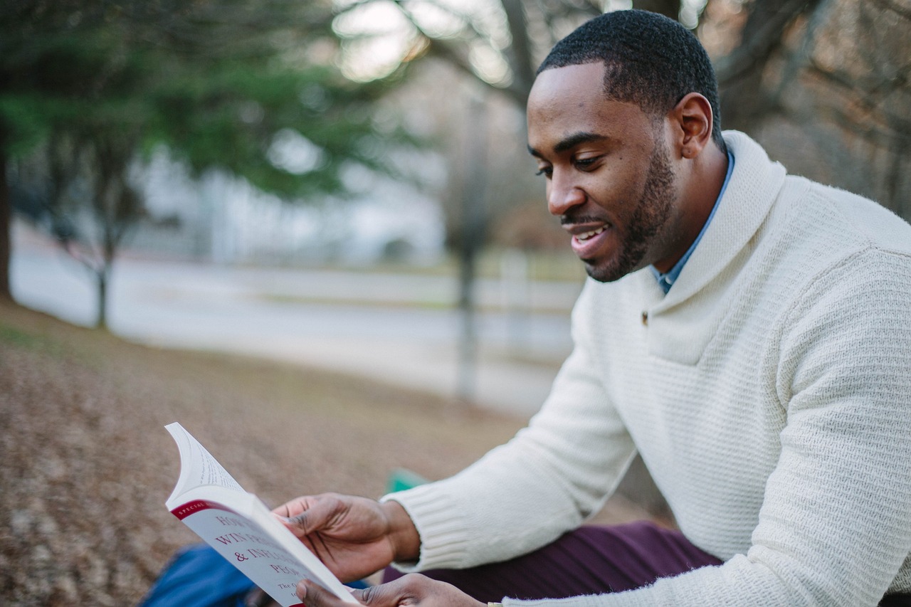 MAN READING BOOK 5